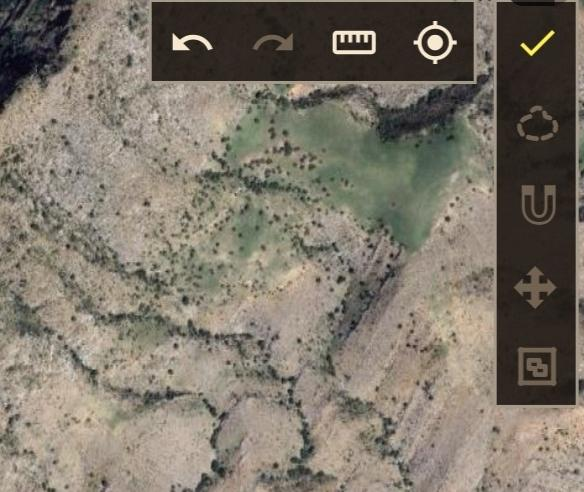 Confirming manual boundary editing with the toolbar checkmark.